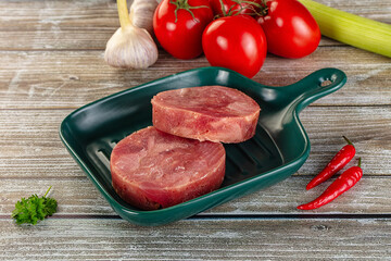 Raw round tuna fish fillet