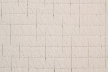 Fototapeta premium Quilted fabric. The texture of the blanket. Background to your project