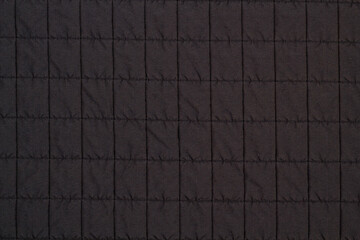 Fototapeta premium Quilted fabric. The texture of the blanket. Background to your project