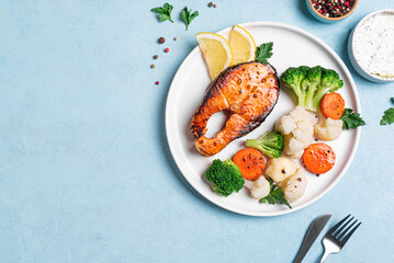 Healthy grilled fish salmon steak and vegetables