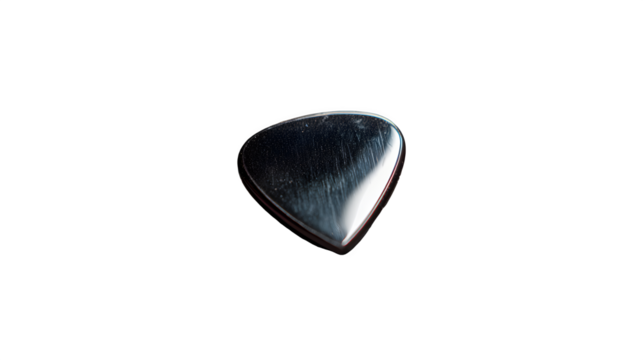 A single guitar pick isolated on a black background with visible scratches and reflections on its surface