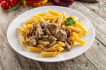 Italian pasta penne with chicken liver