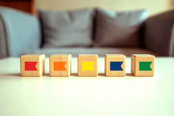 Strategic Planning and Priority Roadmap Concept with Colorful Flag Icons on Wooden Blocks