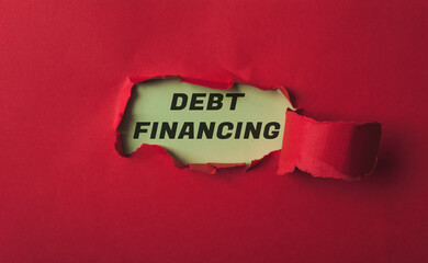 Torn paper revealing debt financing concept on vibrant red background for financial themes