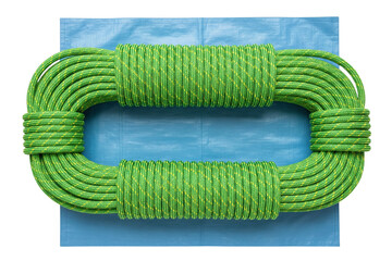 Coiled green climbing rope placed on blue plastic tarp on a transparent background