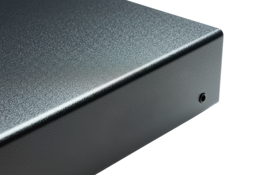 Black metal chassis corner with textured finish detail on a transparent background