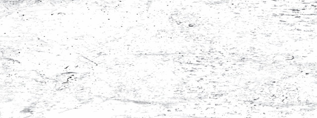 High resolution abstract grunge texture features bold black ink splatters and distressed marks fading into a clean white background, vector illustration.