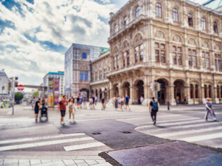 Naklejka premium Crowd of anonymous people walking on busy city street 