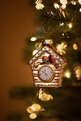 A photo of a clock-shaped Christmas tree ornament.