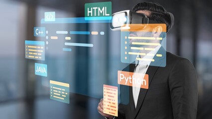 A businessman experiences immersive technology through a virtual reality headset, exploring coding languages and programming concepts in a modern office setup. Raster