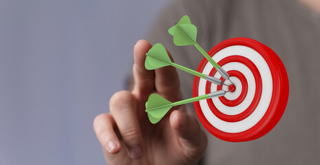 Concept of business strategy, success, and achievement. Darts hitting bullseye of target. Metaphor...