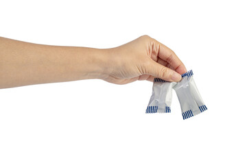 Plastic bag snack packaging and hand holding isolated on transparent background