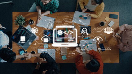 Engaging team meeting in a modern office featuring collaborative discussions, digital tools, and data analysis, highlighting teamwork and innovation in a dynamic workspace. Trope