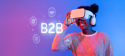 An energetic woman explores virtual reality technology, representing the connection and innovation...