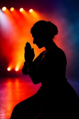 A silhouette of a classical dancer in a dancing pose