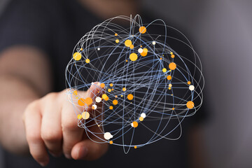 Close up of a hand interacting with a digital network sphere, representing global connection, communication, and technological advanc