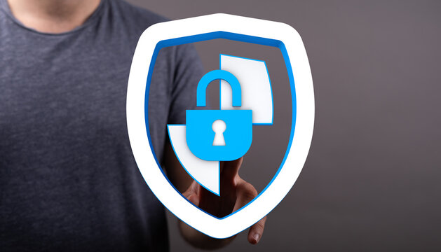 Concept of cybersecurity and data protection. Person interacting with a digital shield and padlock, symbolizing internet safety and s - Powered by Adobe