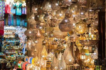 Hundreds of colorful Egyptian lamps glowing in a traditional Arabic shop in Cairo