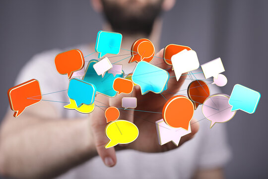 Concept of communication, social media, connection and networking. A hand touching digital chat bubbles - Powered by Adobe