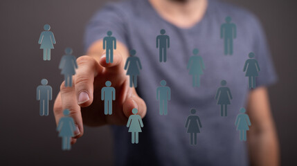 Man touching person icons, representing online social networking, communities, connection, and teamwork. Concep