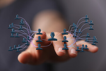 Abstract image of a network concept. Connection lines linking people. Representing communication, support, and collaboration within a company.