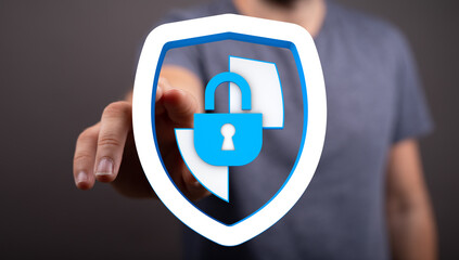 Secure digital data concept with a person interacting with a shield and padlock symbol, representing safety and protection.
