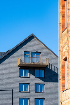 Modern housing and Scandinavia architecture in a Stockholm urban residential area featuring minimalism and facades that stand out clearly under consistent clean light