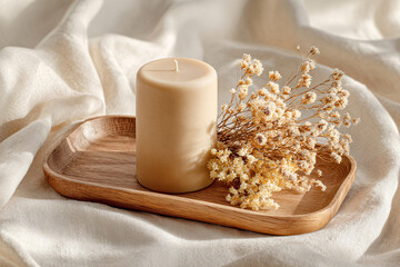 Beige Candle and Decor on Wooden Tray