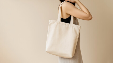 Stylish woman showcasing a simple tote bag