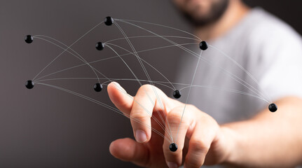 Abstract image of hand interacting with network of connections. Symbolizing connectivity and communication.