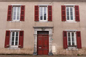 Facade of a house in a rural setting in the French Pyrenees