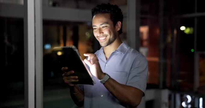 Night, media agency and man in office, tablet and smile with publication, website blog and email. Evening, person and journalist in workplace, tech or research for news report, app and online reading