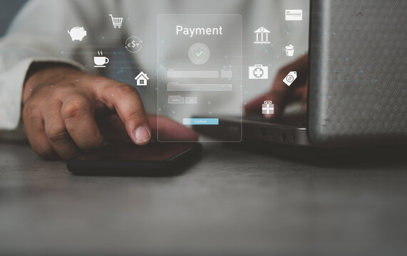Digital banking network, internet payment, financial technology or FinTech concept. Businessman using smartphone with icons on virtual screen, online shopping and payment via mobile banking apps