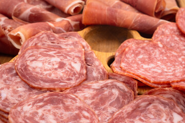 Cured meat platter. Italian meat platter prosciutto ham, bresaola, pancetta, salami.