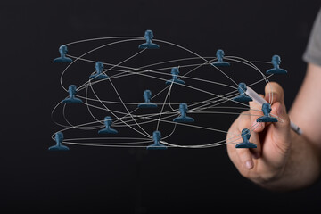 Visualize connection, teamwork, and networking with a modern concept showing global connectivity and hand-drawn connections in digital network.