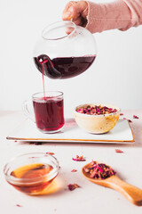 Vibrant Red Hibiscus Tea with Dried Petals