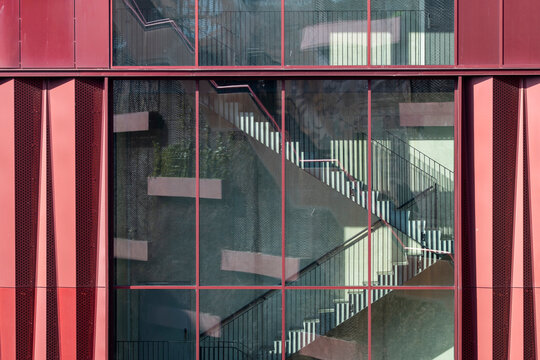 Architecture rendered through staircase angles meeting geometry across a sculptural structure enriched by urban metal detail creating modern symmetry framed within intentional minimal design accents