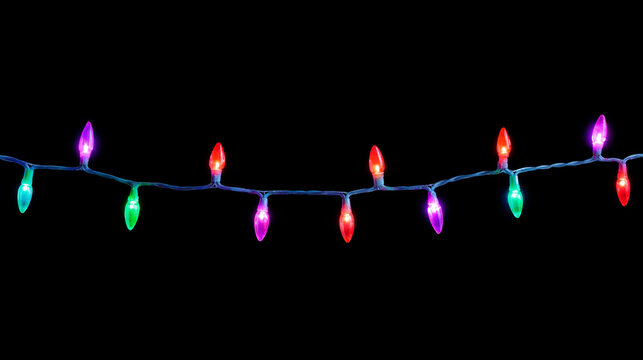 Christmas light garland isolated on black background. Christmas tree string lights with multicolored bulbs. Christmas decorative illumination