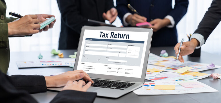 Analyst team use sticky note for creative and analytic brainstorm for business idea with BI data dashboard on laptop screen. Analysis financial data visualization tech for marketing strategy. Prodigy - Powered by Adobe