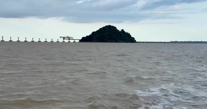 The ferry crosses the Batang Lupar river, connecting Sebuyau and Triso as part of the coastal road route often used as a shortcut between Kuching and areas like Sarikei or Sibu.