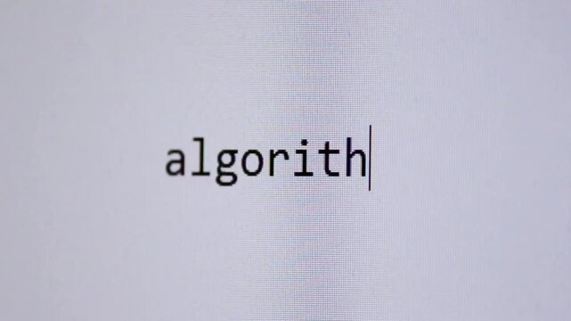 The word &ldquo;algorithm&rdquo; being typed on a clean white digital screen, symbolising data processing, coding, automation, and the hidden systems shaping online and technological behaviour