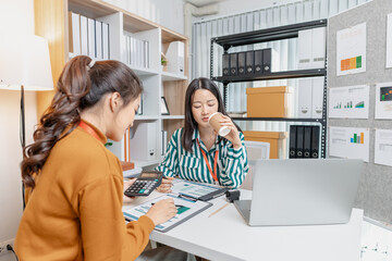 A group of professionals engaged in a collaborative business meeting, exchanging innovative ideas and strategies to build growth and success in a modern startup environment.