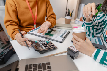 A group of professionals engaged in a collaborative business meeting, exchanging innovative ideas and strategies to build growth and success in a modern startup environment.