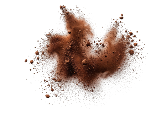 Explosion of brown cocoa powder with large and small particles flying around