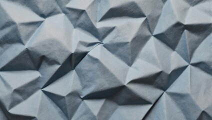 Abstract geometric pattern with crumpled paper texture in shades of blue and gray.