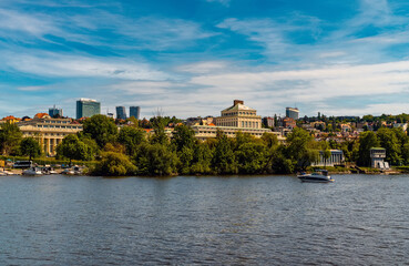 Obraz premium Modern and historic Prague skyline along Vltava river.