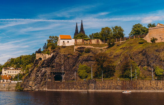 Vysehrad rock tunnel entrance on Vltava River bank.