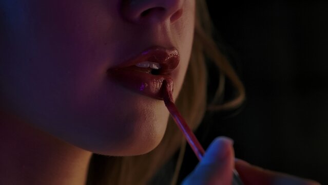 Close up of Lips with Glossy Lipstick Application - Powered by Adobe