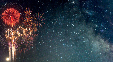 Fireworks with blur milky way background