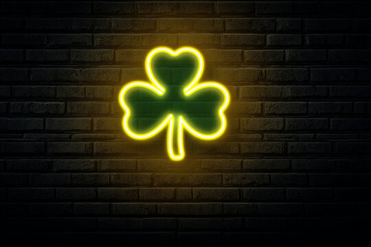 Neon shamrock green clover glowing sign dark brick festive luck